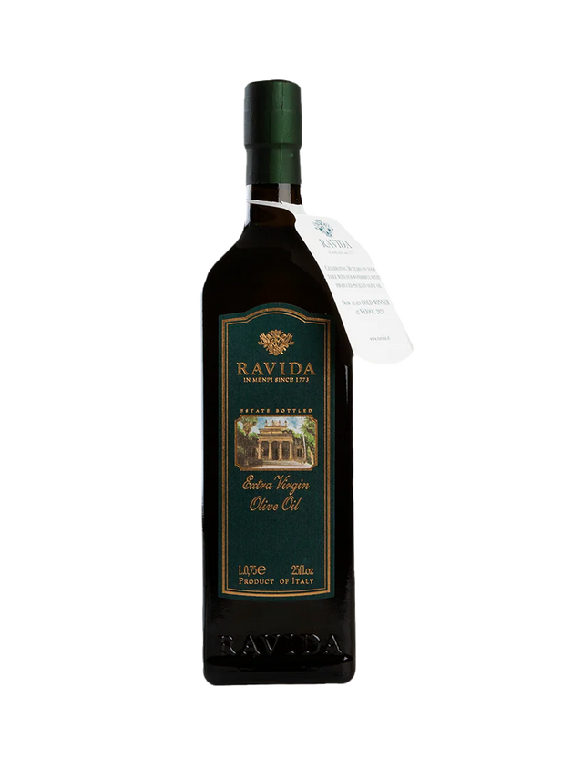A bottle of RAVIDA extra virgin olive oil with a label indicating it is produced in Sicily.